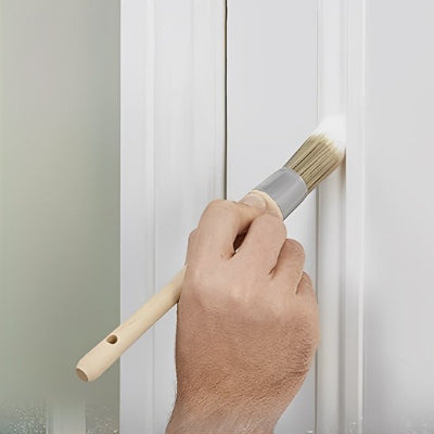 Pinceau rechampir utiliser pour peindre un cadre de porte