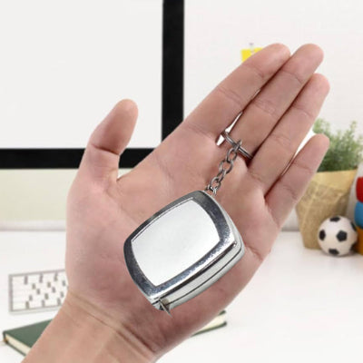 Présentation dans une main Metre ruban Porte-clés