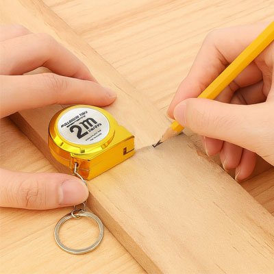 Traçage sur planche avec Ruban metre Mini Portable